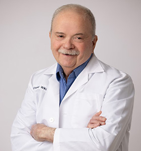Dr. Schield Wikas - Board-Certified Dermatologist and Skin Cancer Surgeon